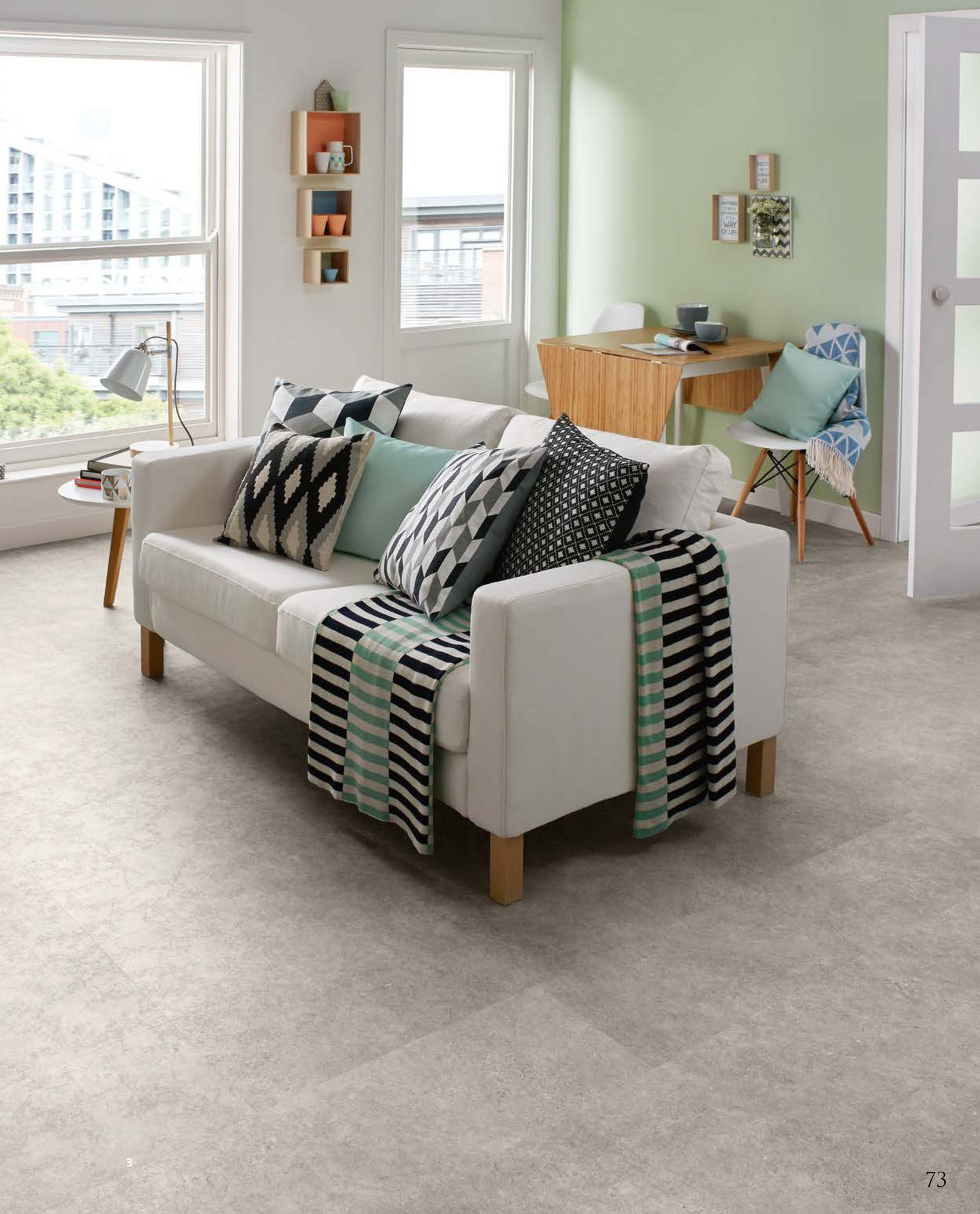 Luxury vinyl flooring in light burnished-concrete colour